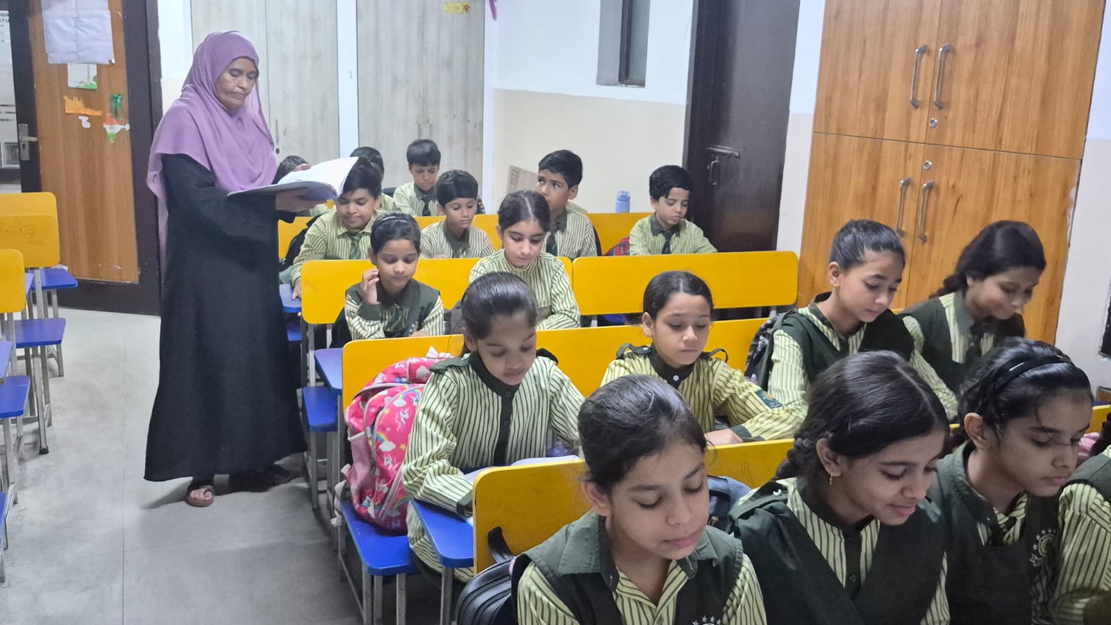 Students learning in a bright classroom